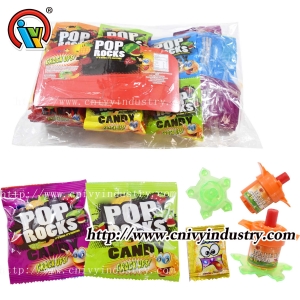 Torsion peg top toy with pop rocks candy